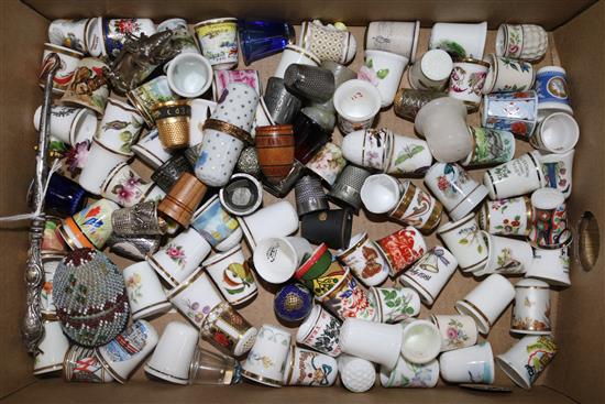 Five thimble display domes and a collection of ceramic, treen and other thimbles,